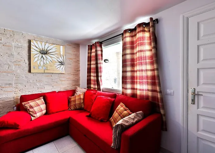 Gin Gin بويرتو ذيل كارمين