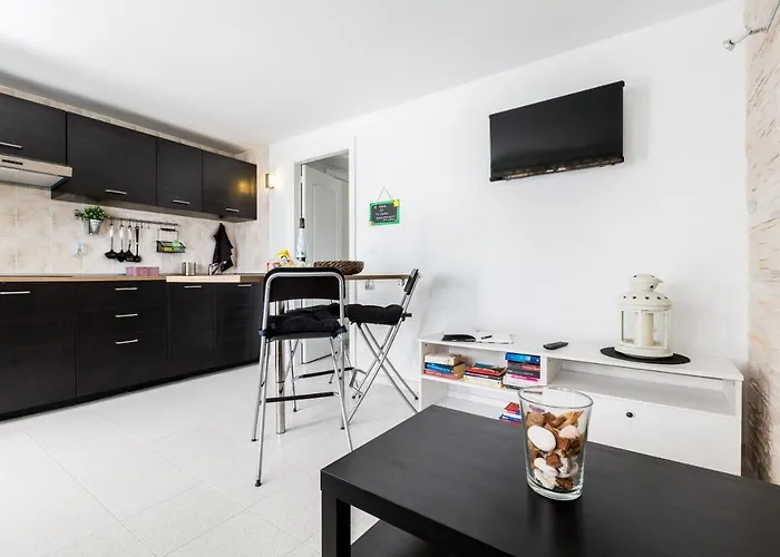 Gin Gin بويرتو ذيل كارمين